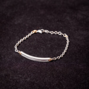 Bracciale in titanio e oro giallo con diamanti